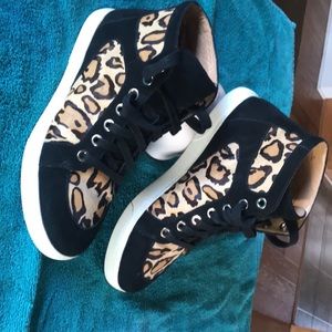 Leopard print and black low top Casual wear tennis shoes.